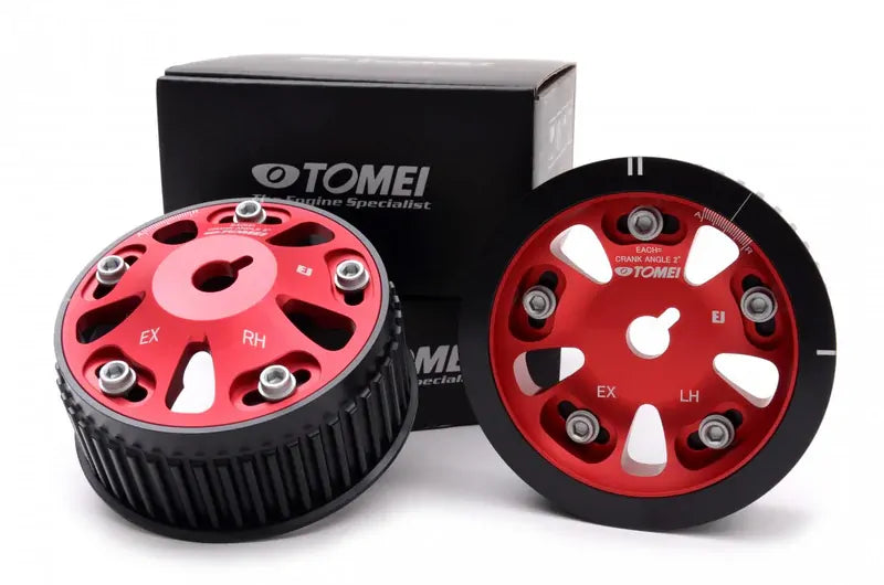 Pair of red and black Tomei adjustable exhaust AVCS cam gears