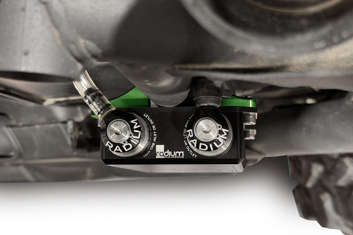 Radium charcoal canister inlet and outlet ports