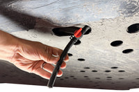 Radium charcoal canister drain valve tucked under Can-Am Maverick