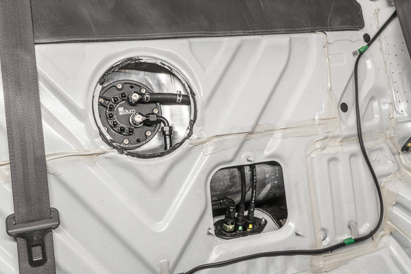 Radium 20-0940 fuel pump hanger plumbed to the OE lines