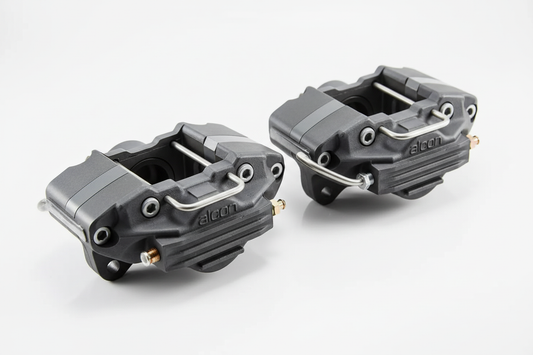 Alcon caliper pair pure white background