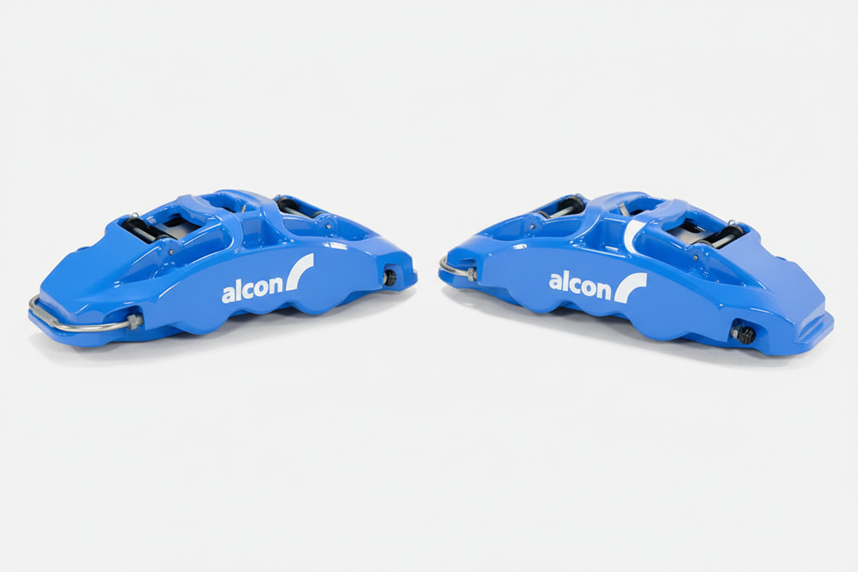Alcon CAR99 blue 6-piston caliper pair white background
