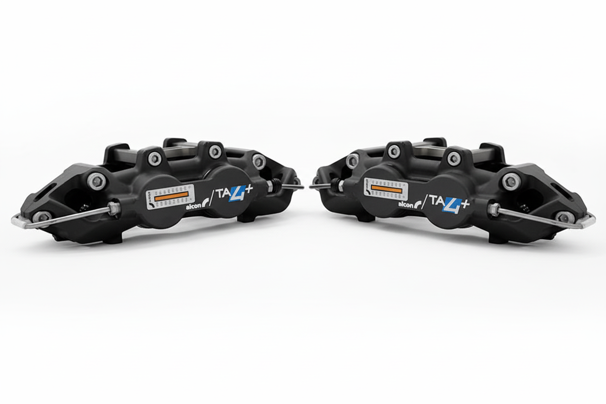 Alcon TA4+ brake caliper pair on white background