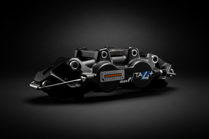 Alcon TA4+ caliper dark background editorial