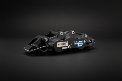 Alcon TA6+ caliper dark background editorial