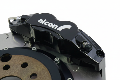 Black Alcon brake caliper on rotor