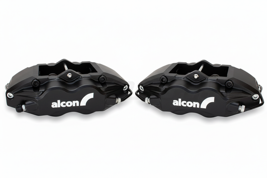 Black Alcon brake calipers with white logo