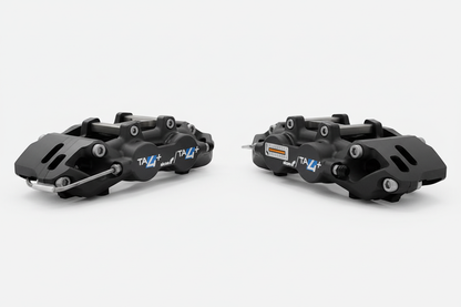 Pair of Alcon TA4+ brake calipers on white background