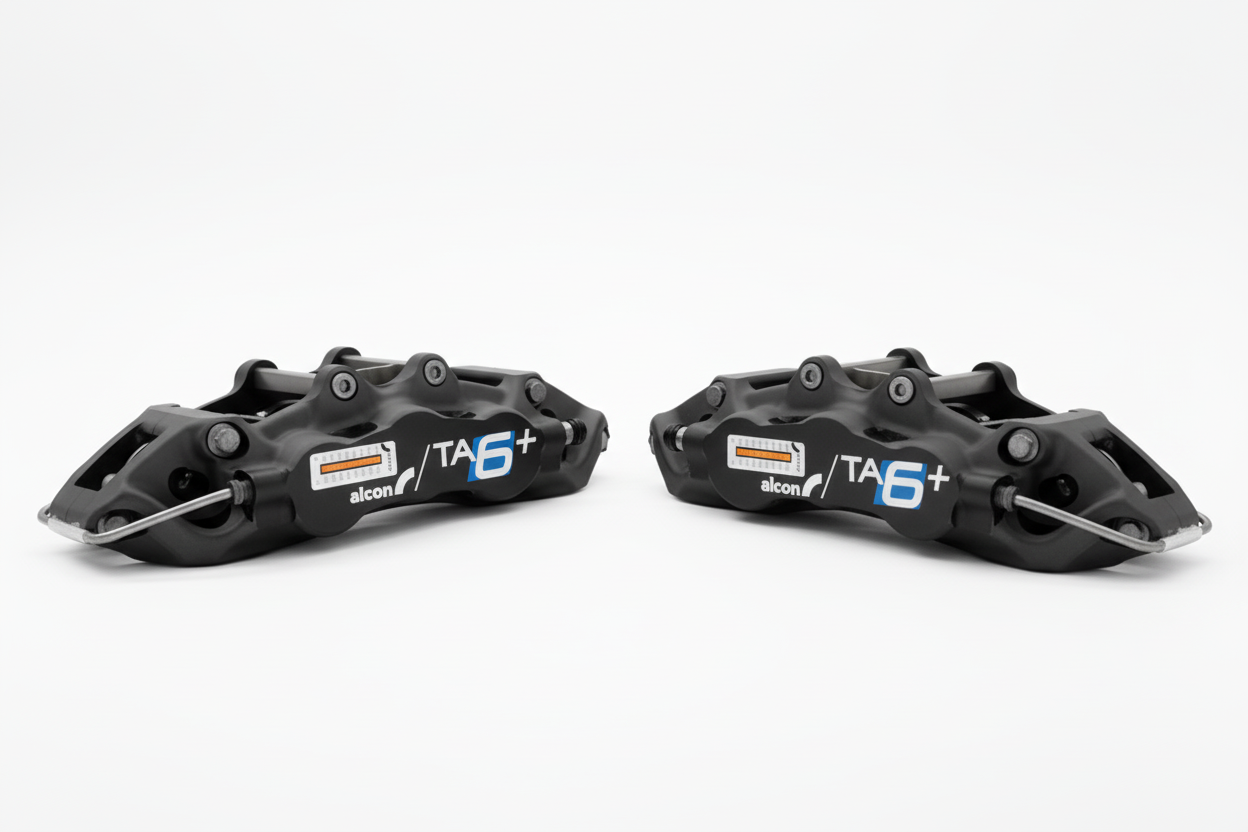 Two Alcon TA6+ callipers - bright white background