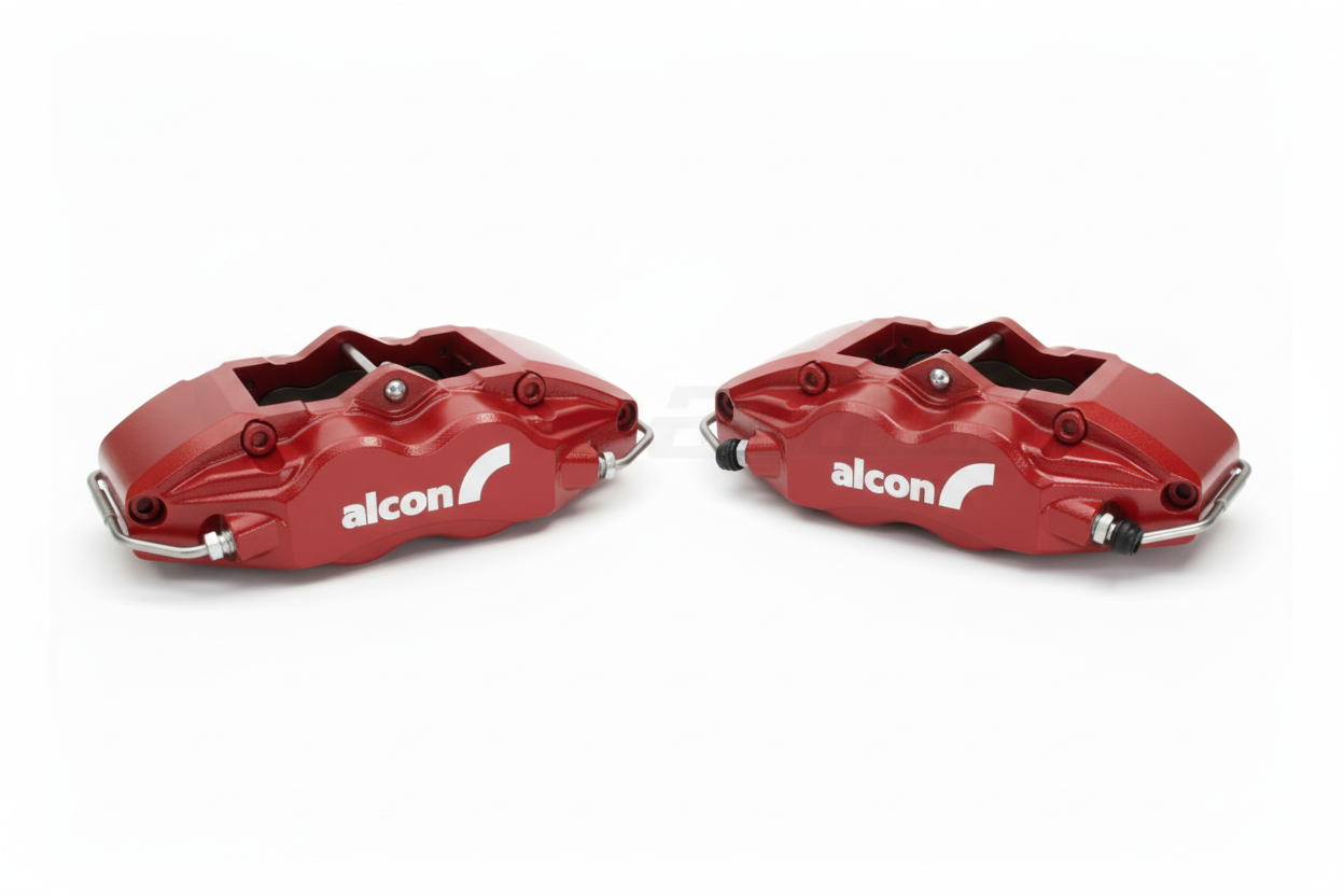Two red Alcon brake calipers